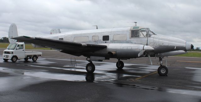 Beechcraft 18 (N122GS) - A 1957 model Beech BE-18S Volpar Turboliner, operated by Dixie Aviation Enterprises, on the GA ramp at Pryor Field Regional Airport, Decatur, AL - mid-morning October 5, 2021.