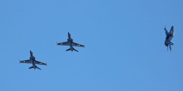 Boeing Goshawk (15-5204) - A trio of Royal Canadian Air Force BAe CT-155 Hawks, using call sign "Moose Flight," begin coming out of formation and breaking left as they prepare to land for a brief pit stop visit while enroute back to their home base at CFB Cold Lake, Alberta.br /From left: 155214, 155218, and breaking left, 155204.br /This is the second time in the past few months that a flight of RCAF Hawks returning from a training exercise has passed through RNO.