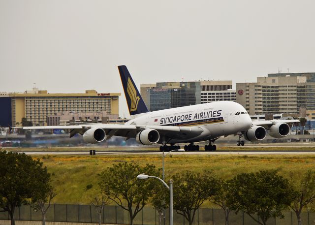 Airbus A380-800 (9V-SKH) - Touching down on runway 24R