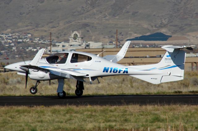 Diamond Twin Star (N16FA) - Touching down on Spanish Forks rwy 30 on a beautiful Halloween afternoon.