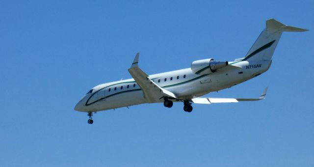 Canadair Regional Jet CRJ-100 (N715AV) - On short final is this 1996 Canadair Regional Jet 100LR SE in the Spring of 2022.