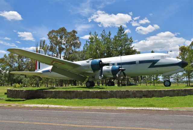 Douglas DC-6 (ETP10018) - Douglas DC-6A ETP-10018 MSN 45226 of Fuerza Aerea Mexicana FAM (Mexican Air Force). Preserved as WFU gate guard at Santa Lucia AB NLU/MMSM (07/2018).