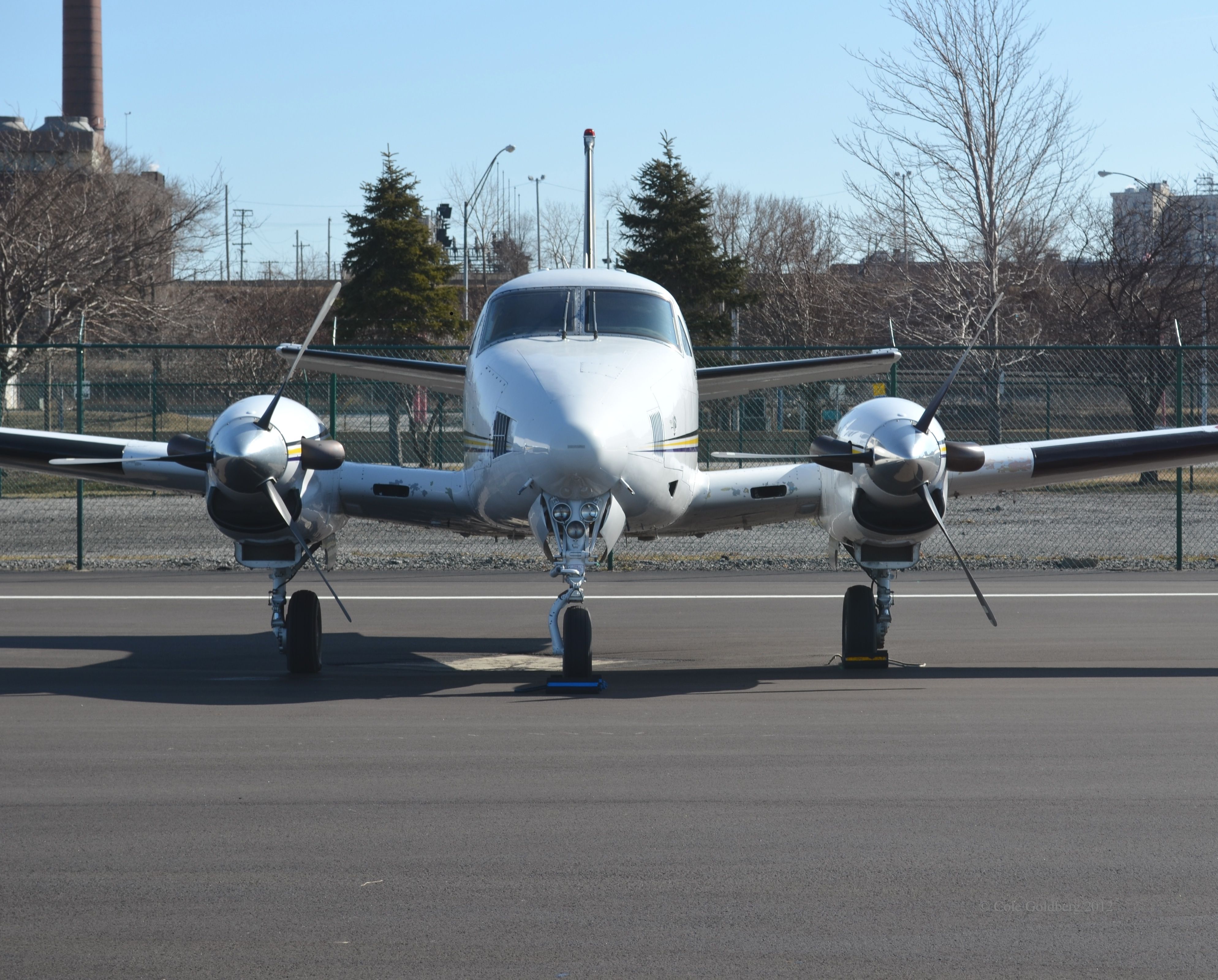 Beechcraft King Air 90 (C-GYET) - C-GYET owned by Evertz Microsystems Ltd. of Burlington, Ontario, Canada, has been parked at Burke Lakefront International Airport, in Cleveland, Ohio, for quite sometime. Please look for more photos at Opshots.net