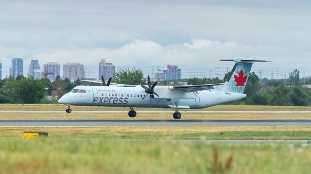 de Havilland Dash 8-400 (C-GJZN) - JZA8530 about to touch down on runway 05 at YYZ, arriving from Thunder Bay