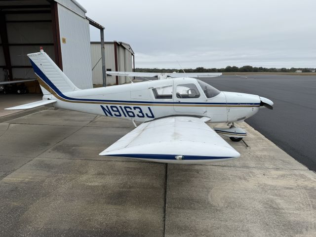 Piper Cherokee (N9163J) - 66 Piper 180 HP on ramp Scott Macdonald aircraft 