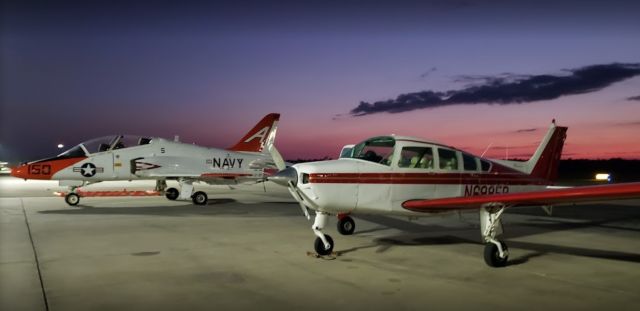 Beechcraft Sierra (N6985R) - Taking a pic next to the Navy trainers!