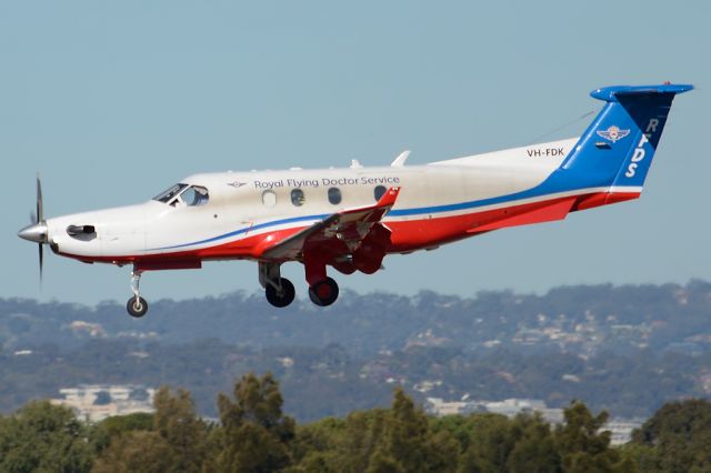 Pilatus PC-12 (VH-FDK) - On short finals for runway 05. Tuesday 22nd July 2014.
