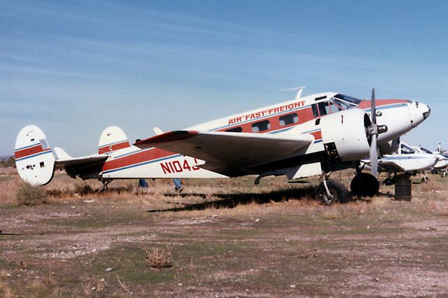 Beechcraft 18 (N104J) - Nov. 1987 - stored at Chandler, AZ - scanned from a print