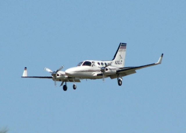 Cessna 421 (N20LC) - Landing at Shreveport Regional.