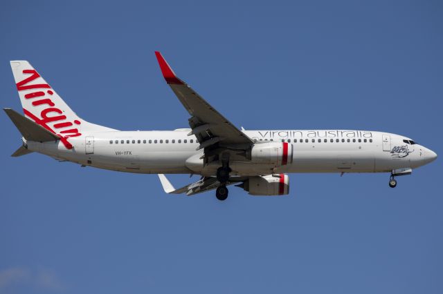 Boeing 737-800 (VH-YFK) - VH-YFK (an 11 year old Boeing 737-8FE) landing as VA223 from Melbourne.