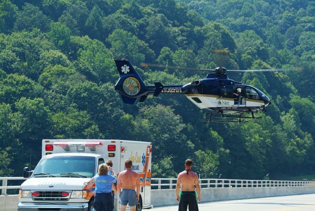 N102HN — - Health Net taking off with patient from bridge at Summersville Lake.