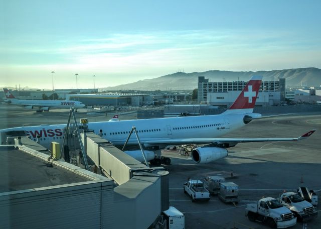 Airbus A340-300 (HB-JMG) - Two Swiss A340s parked at SFO.