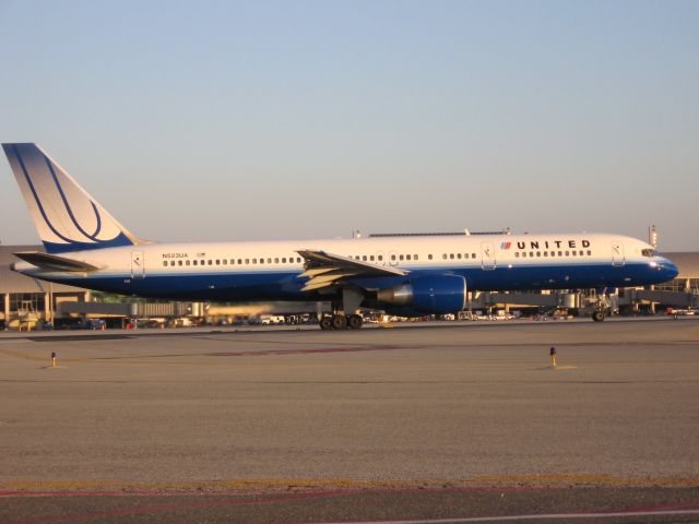 Boeing 757-200 (N523UA) - Holding on RWY 19R