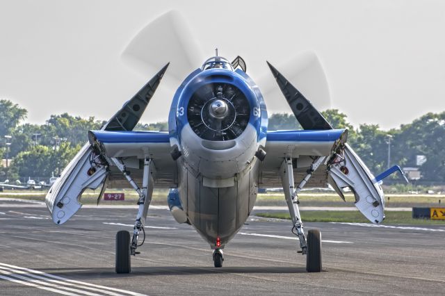 Grumman G-40 Avenger (N683G) - Tom Buck taxiing back to the grass at Oshkosh 2015