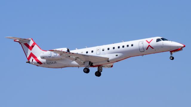 Embraer ERJ-135 (N254JX) - Second row shows someone taking a photo of me...role reversal innit.