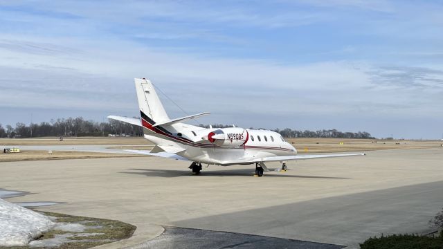 Cessna Citation Excel/XLS (N590QS) - N590QS, a 2007 Cessna 560XL Citation XLS, all cozied up for an overnight stay @ KVPZ. 3/2/22. 