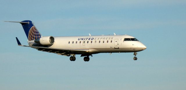 Canadair Regional Jet CRJ-200 (N492SW) - On final is this 1997 United Express Canadair Regional Jet 200LR from the Spring of 2021.