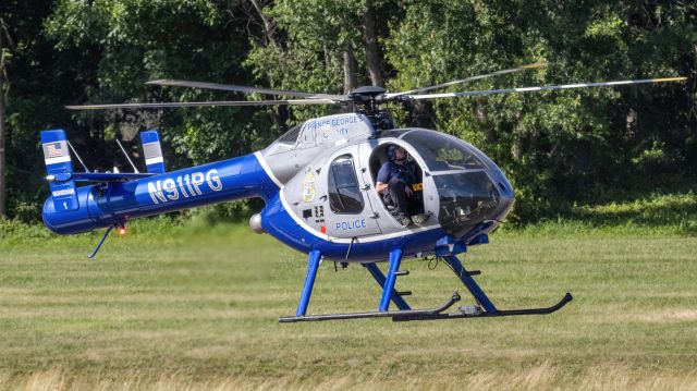 MD HELICOPTERS MD-520N (N911PG) - N911PG hover-backtracking to College Park Airport's runway 33