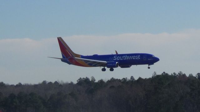 Boeing 737-800 (N8642E) - Landing runway 23L.