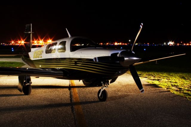 Mooney M-20 Turbo (N305PE) - Miss Long Legs and Brains at night