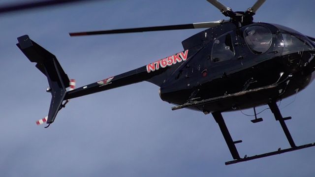 MD Helicopters MD 500 (N765KV) - Checking power lines in the area.