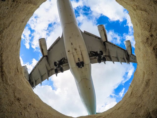 Airbus A340-300 (F-GLZU) - Air France F-GLZU passing over Maho beach and landing at St Maarten