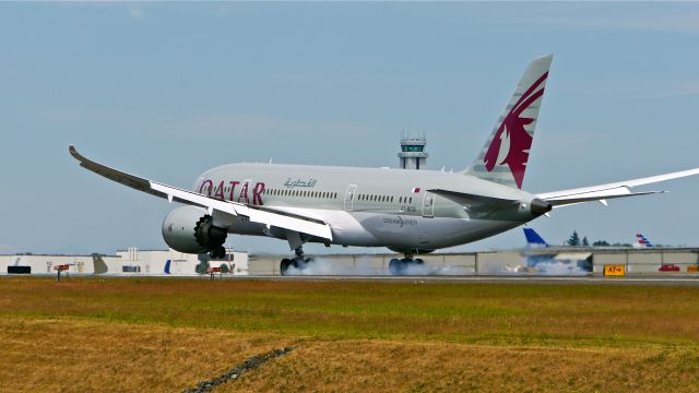 Boeing 787-8 (A7-BCO) - BOE474 makes tire smoke on landing Rwy 34L to complete a flight test on 7/13/14. (LN:188 / cn 38333).