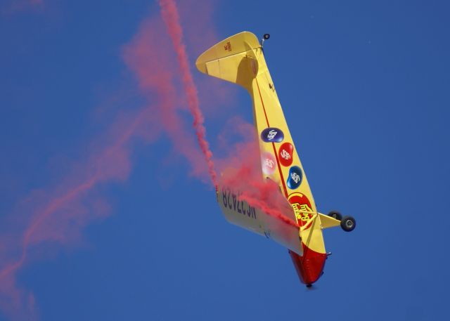 — — - Kent Pietsch In his Jelly Belly Interstate performs at AirVenture 2011