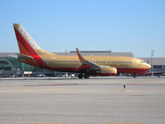 Boeing 737-700 (N711HK) - Holding on RWY 19R