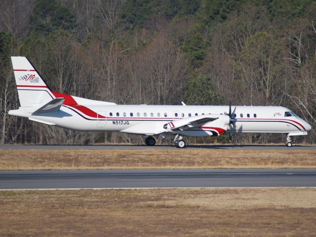 Saab 2000 (N517JG) - Taxiing to runway 20 at Concord Regional Airport (Concord, NC) - 2/7/09.   Destination: Daytona