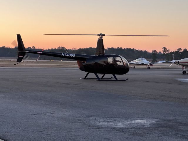 Robinson R-44 (N74365) - R44 getting ready to take off for an early morning flight.