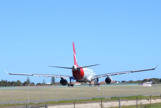 Airbus A330-300 (VH-QPC) - Turning from taxi-way on to runway 05 for take off for flight to Singapore.