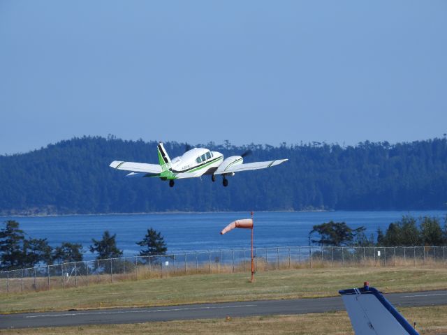 Piper Aztec (N927PT) - Albion Air taking off from Friday Harbor to Portland (FHR - UAO). Photo by Steven K. Roberts, 83X zoom (Nikon P900), July 23, 2017