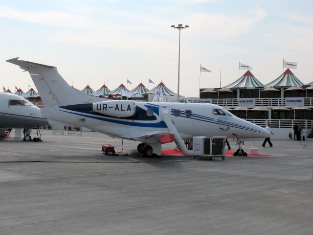 Embraer Phenom 100 (UR-ALA) - At Dubai Air Show 2013.