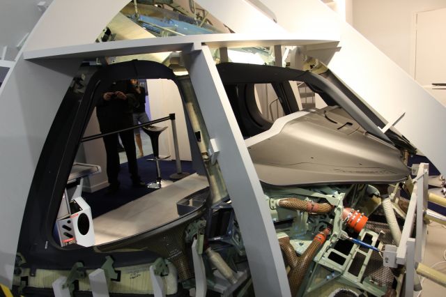 Airbus A350-900 — - Mock up of Airbus A350-900, flight deck, revealing surface panels and the ducting beneath for cooling equipment.