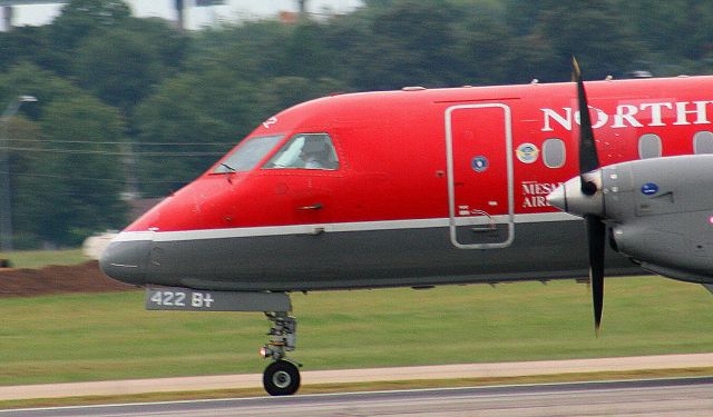 Saab 340 (N422XJ) - Mesaba 3034 rolls down runway 25 for departure to Memphis.