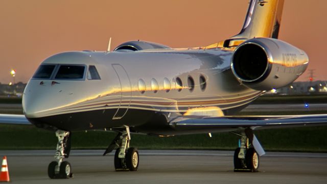 Gulfstream Aerospace Gulfstream IV (N187SG) - N187SG in the fading sun during an overnight stay at Million Air Indy.br /br /This aircraft is a 2011 Gulfstream G450 (GIV-X), SN 4242, owned/operated privately. 9/30/22. 