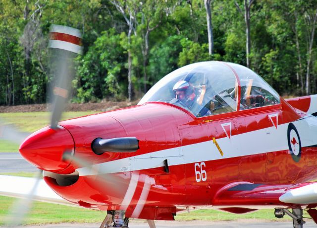 HAWKER DE HAVILLAND PC-9 — - RAAF Roulettes PC-9 finishes an aerobatic display at Airlie beach, Qld.