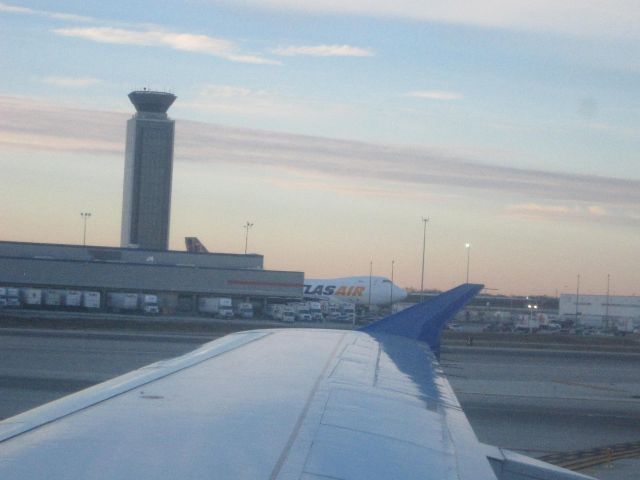 Boeing 747-400 — - View from a United A320.