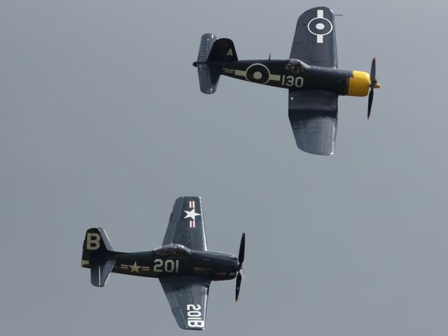 — — - Flypast at Duxford Air Museum, of two WWII veterans.