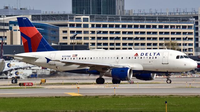 Airbus A319 (N359NB) - Delta Airlines A319 passes by for its takeoff on 30L.