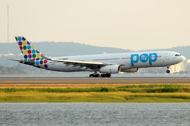 Airbus A330-300 (9H-POP) - 'Shamrock 137' from Dublin touching down on 33L. Hi Fly in Fly POP livery, subbing for Aer Lingus A330.