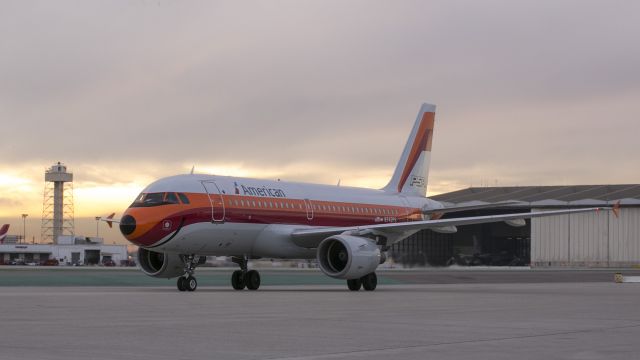 Airbus A319 (N742PS) - This American Airbus A319 is painted in its ancestral legacy colors from the the good old PSA days. This plane has spent the night at the hangar getting routine maintenance from competent and well trained technicians. It is waiting for a gate to open then it will be taxied to the terminal by AMTs (Aircraft Maintenance Technicians).