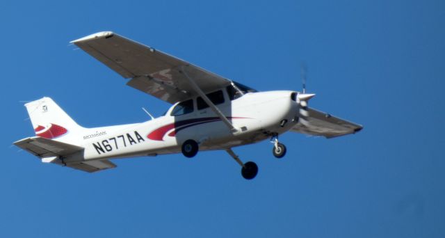 Cessna Skyhawk (N677AA) - Shortly after departure is this 2018 Cessna 172S Skyhawk SP in the Winter of 2024.