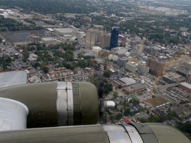 Boeing B-17 Flying Fortress (N5107N) - A look at Downtown Lexington, KY over the port wing of "Aluminum Overcast".... Shes visiting The Aviation Museum of Kentucky on 05 and 06 Oct 2010 for rides and tours... The EAA keeps her airborne as a tribute to those whove put their lives on the line for our freedoms....