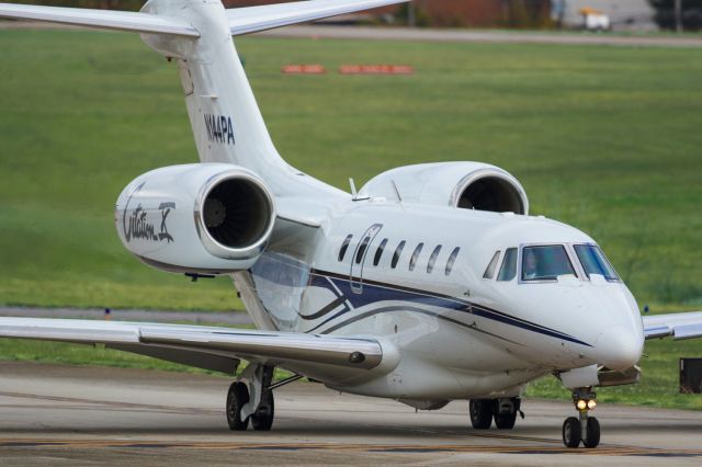 Cessna Citation X (N144PA) - N144PA is a 2003 Cessna Citation X (750) seen here taxiing for departure from Atlanta's PDK executive airport. I shot this with a Canon 500mm lens. Camera settings were, 1/8000 shutter, F4, ISO 500. Please check out my other photography. Positive votes and comments are always appreciated. Questions about this photo can be sent to Info@FlewShots.com