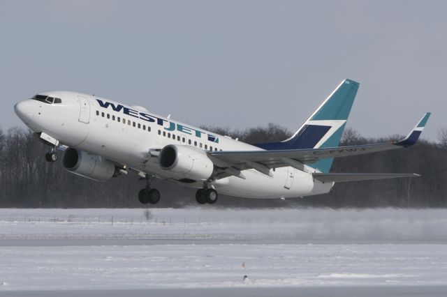Boeing 737-700 (C-FXWJ) - February 18, 2007 - departed London Airport 
