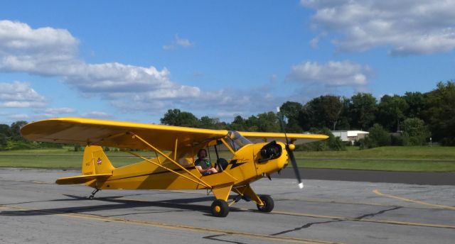 N2090M — - Taxiing along is this 1946 Piper J3C-65 Cub in the Summer of 2018.