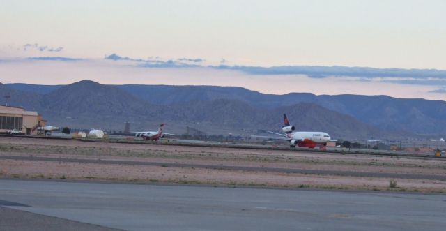 McDonnell Douglas DC-10 (N603AX) - Taxiing for takeoff. Aeroflight Avro RJ85 Bomber in the background, as well as Kirtland AFB