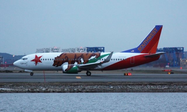 BOEING 737-300 (N609SW) - California One departing Boston at dusk. 